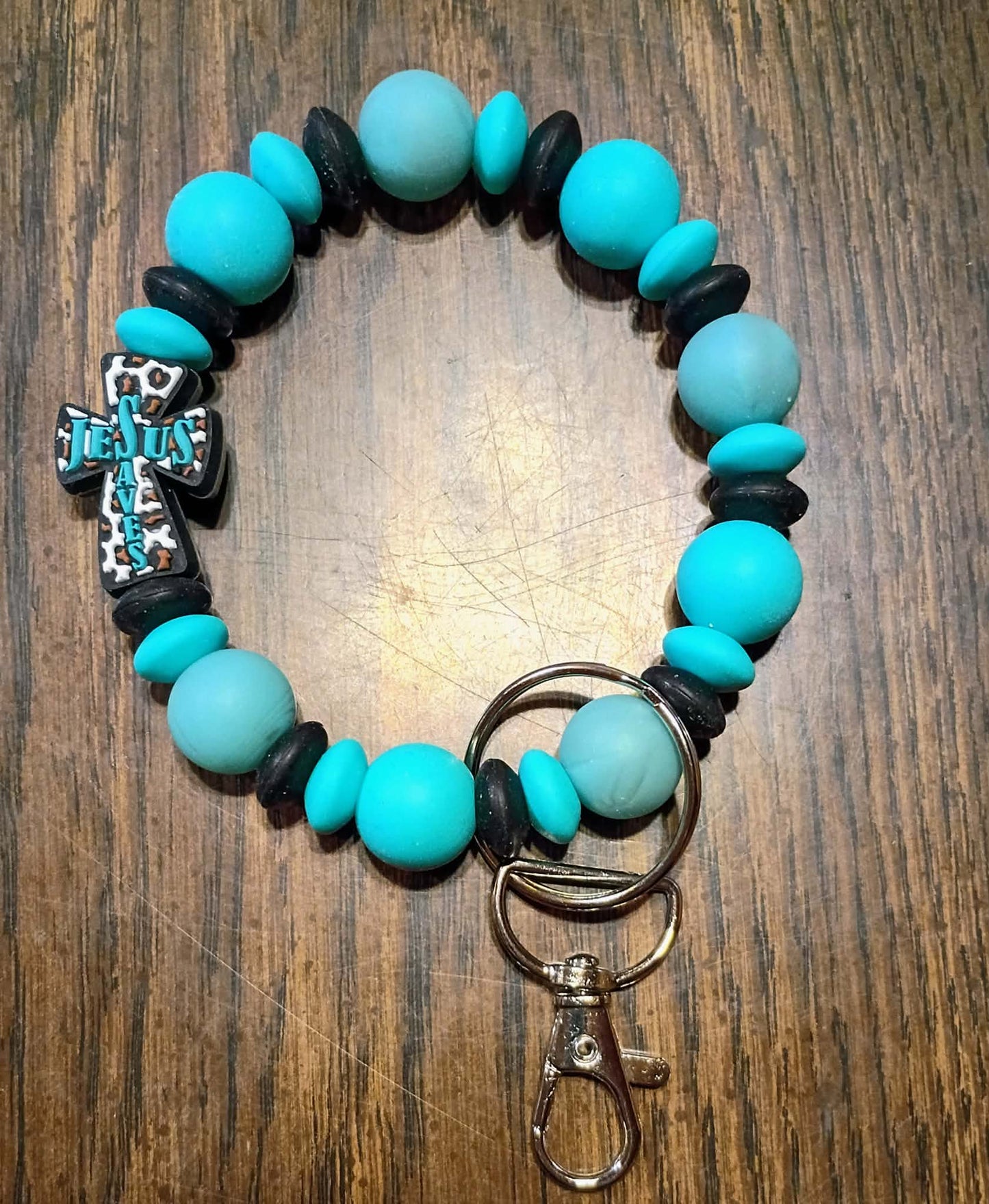 Jesus Saves" Teal & Black Silicone Wristlet
