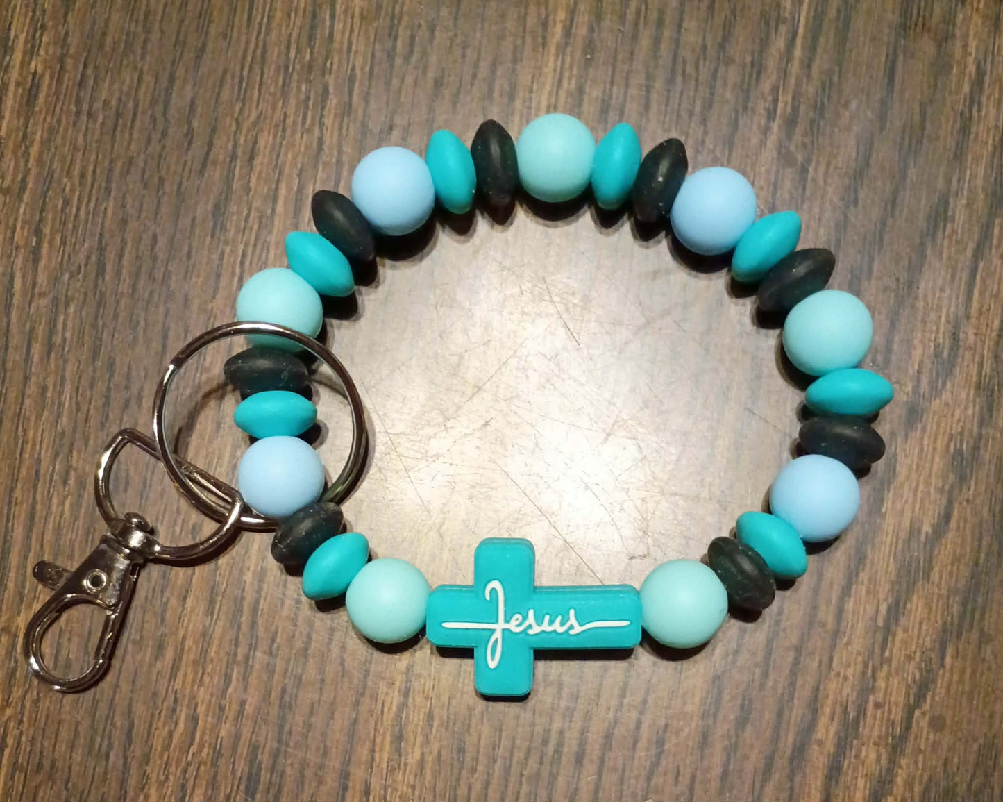 Faith & Teal Cross Silicone Bead Wristlet